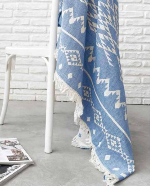 Peshtemal Turkish towel with kilim pattern, blue on white chair - Shopping Blue